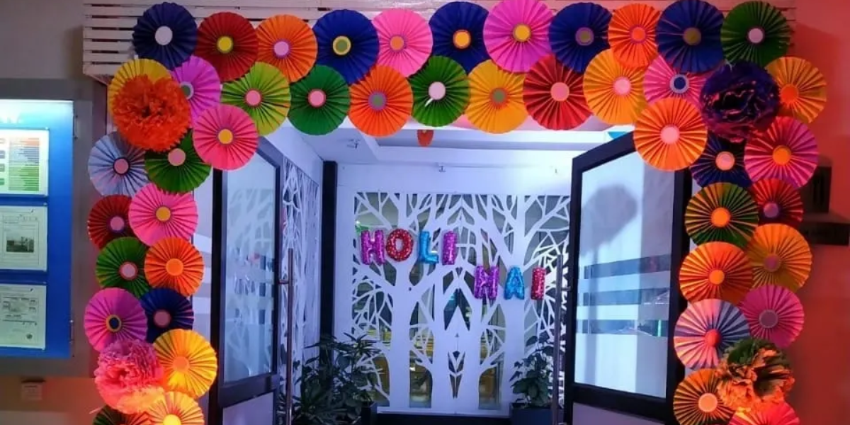 Incorporating Holi Decoration Ideas For Office Into Different Work Zones